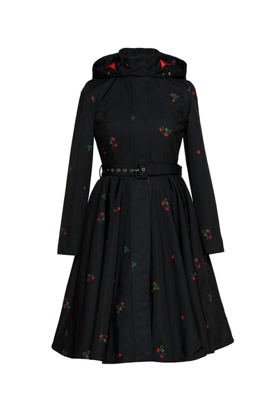 Black winter fit-and-flare coat with delicate strawberry print and contrasting red satin lining by Rainsisters.