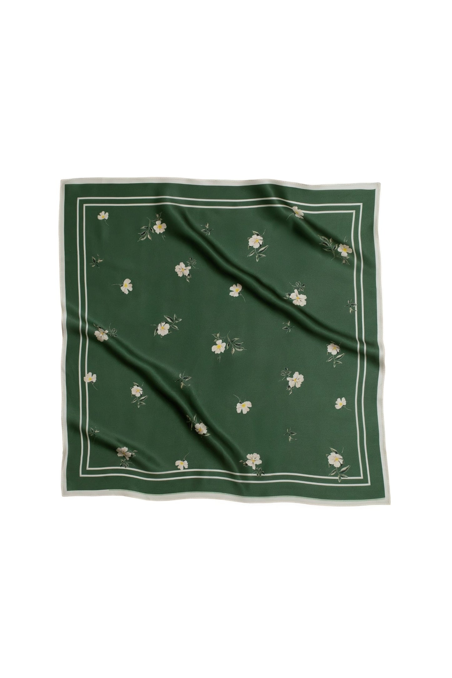 Green square scarf with floral patterns on a white background