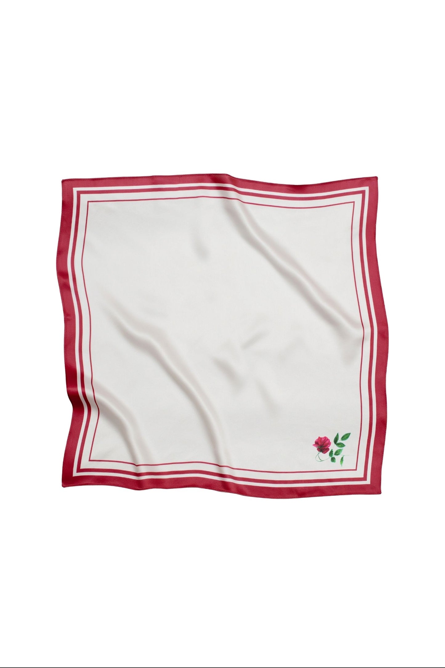 White square scarf with red border and small rose print in the corner on a white background