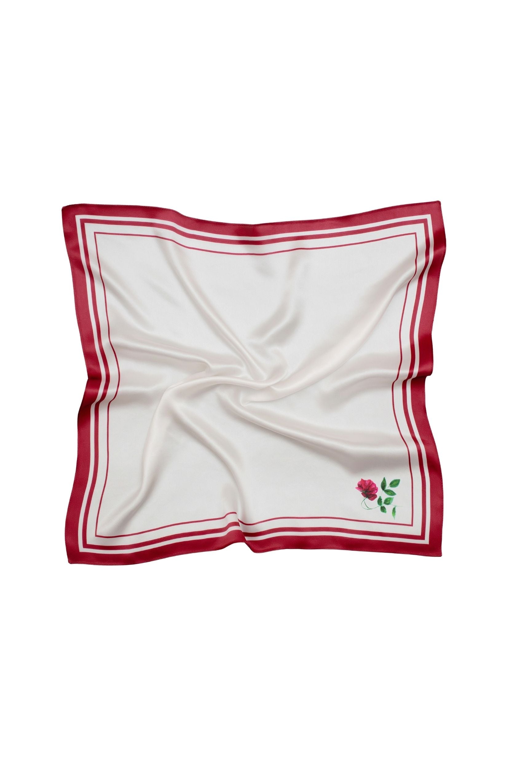 White square scarf with red border and small rose on a white background