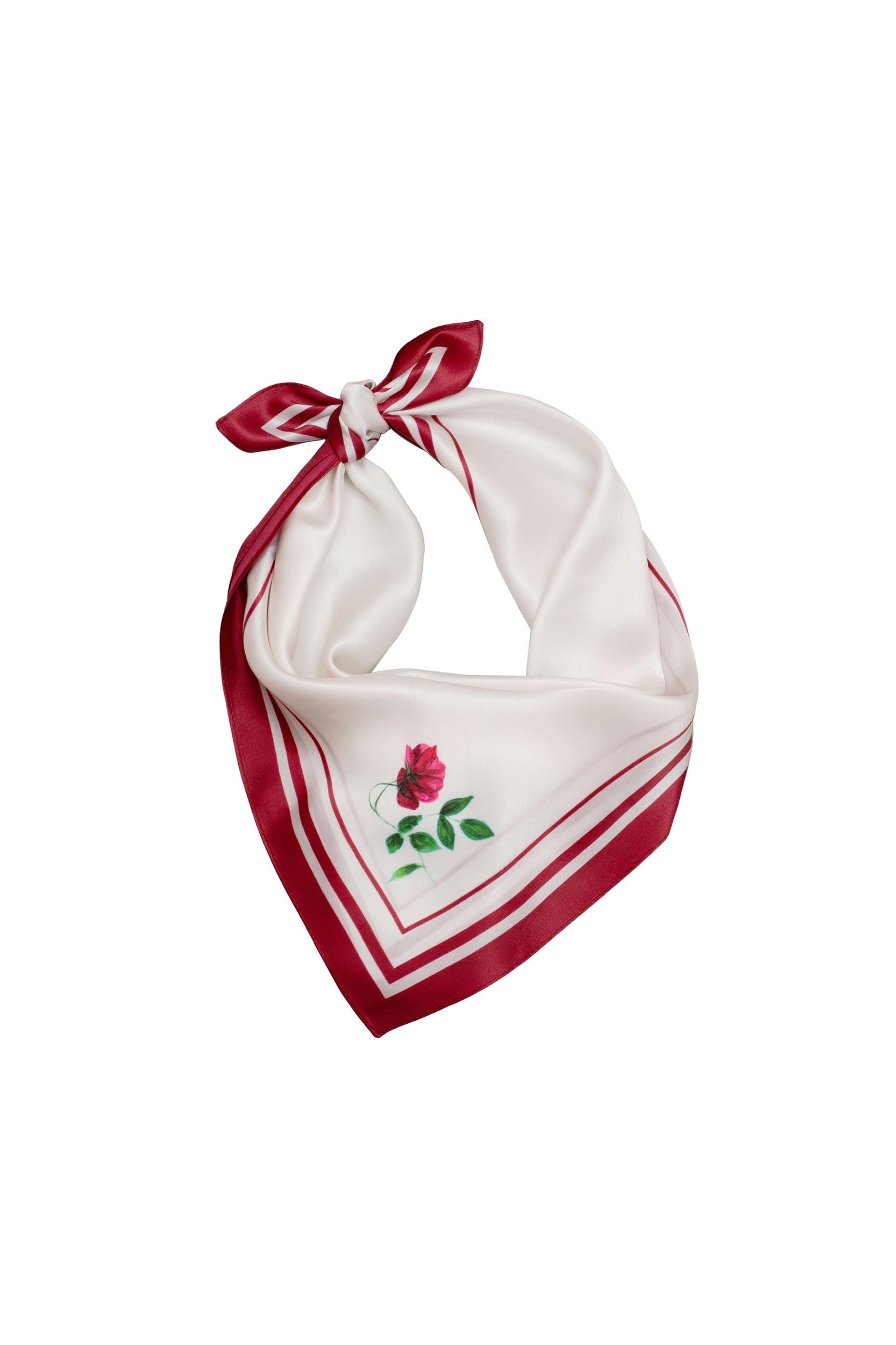 White bandana with red border and floral design on a white background