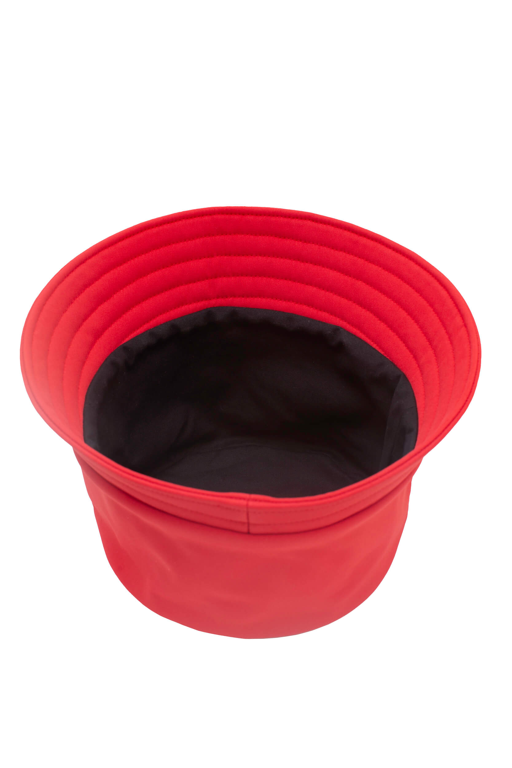 Red bucket hat with black soft cotton interior on a white background
