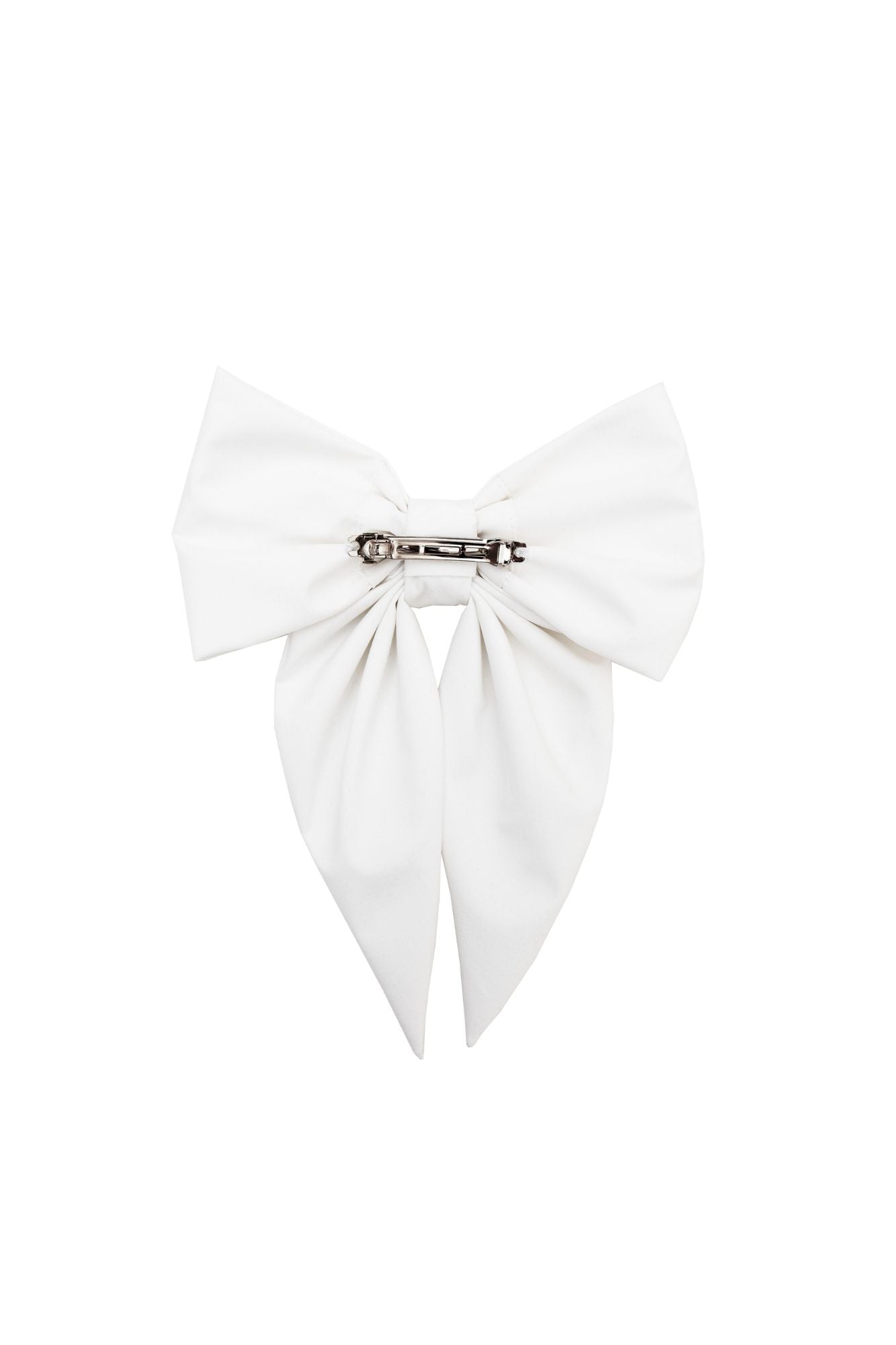 White bow-shaped hair accessory on a white background