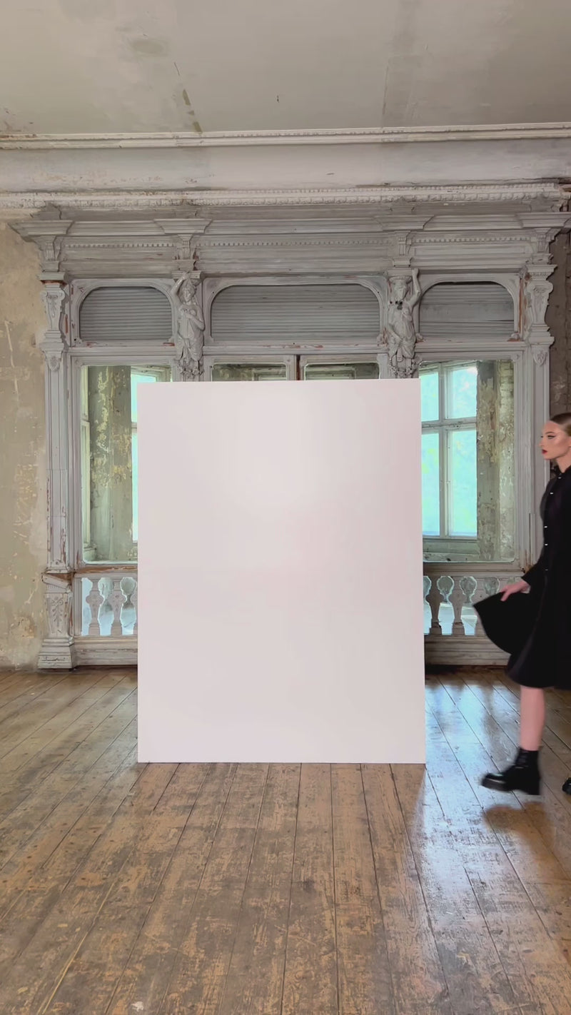 Solid black fitted coat with full volume skirt