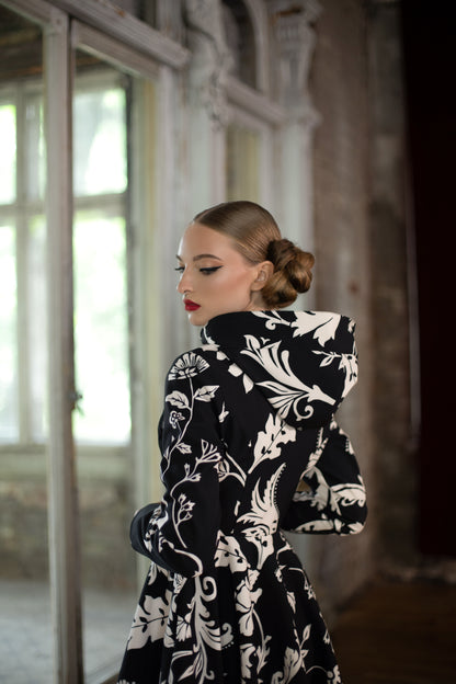 Hooded black and white raincoat