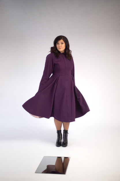 Dark purple coat with pleated skirt