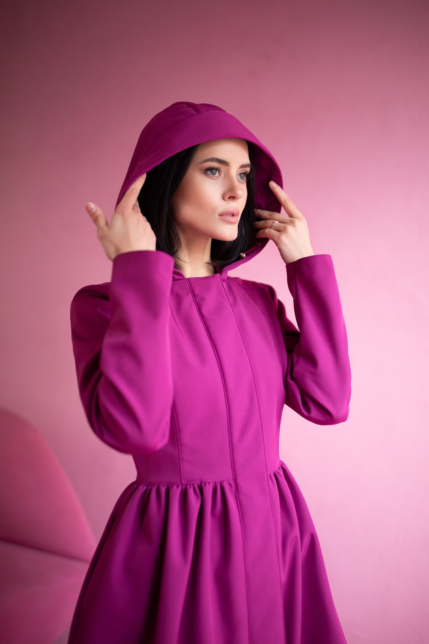 Hooded bright pink waterproof coat with fitted top