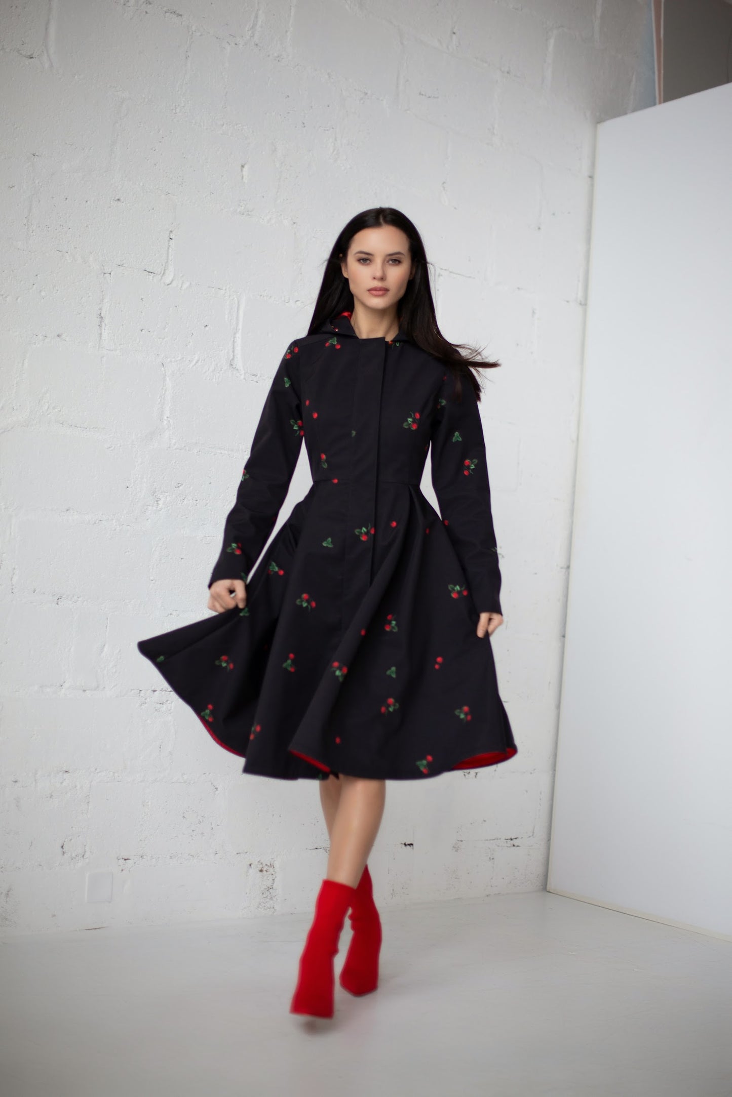 fitted and flared Waterproof Coat with Red Strawberry Print on black background