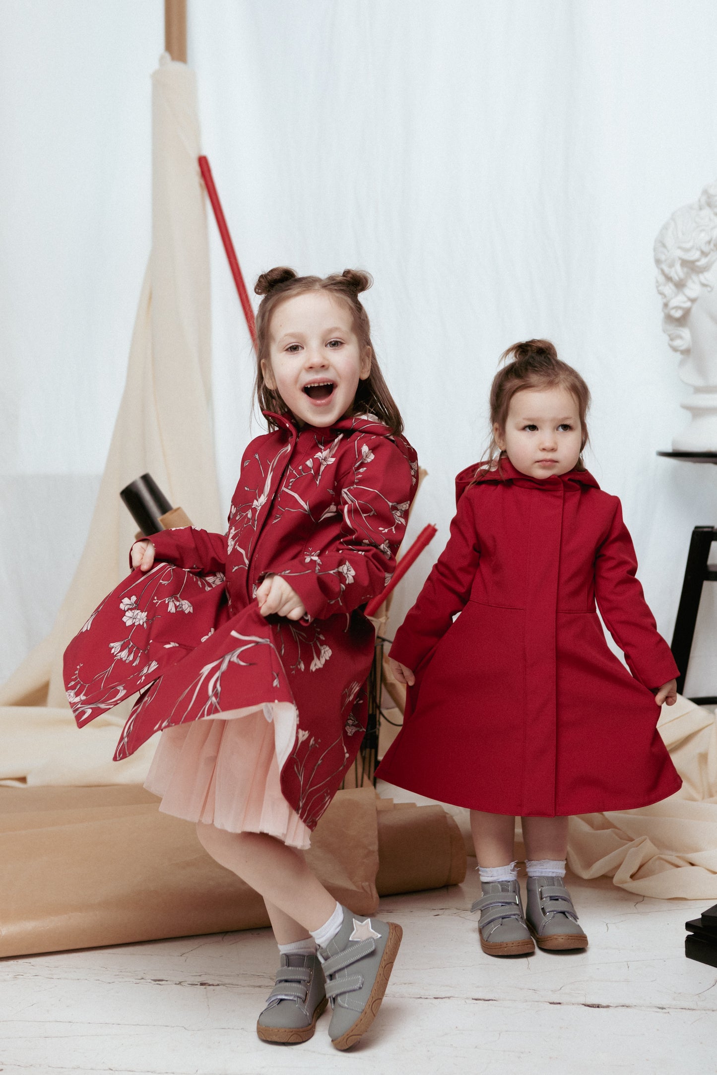 Red Monochrome Raincoat and red waterproof coat with floral print for Girls