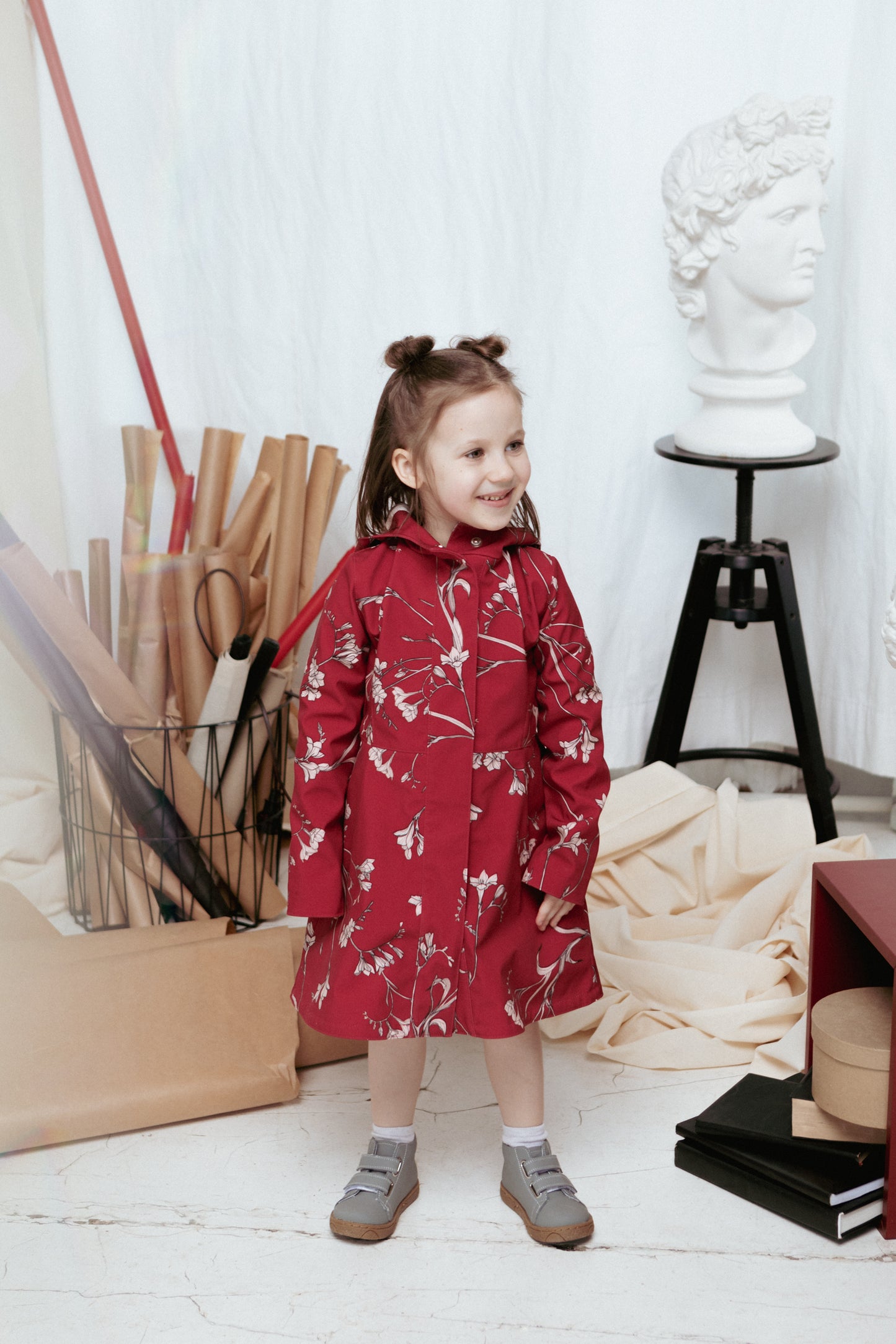 Waterproof Floral Coat with red background and pinkish freesia flower print